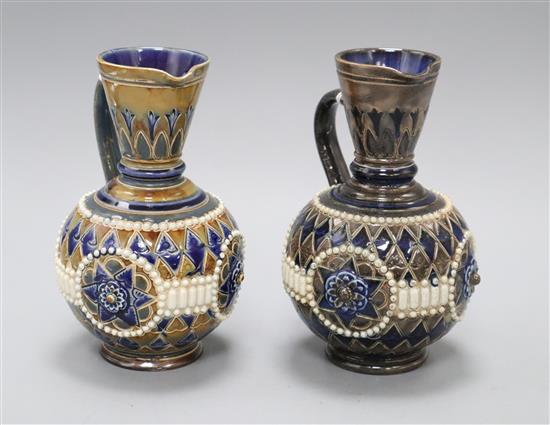 Two similar Doulton Lambeth incised and beaded jugs, assistants marks GP and AB